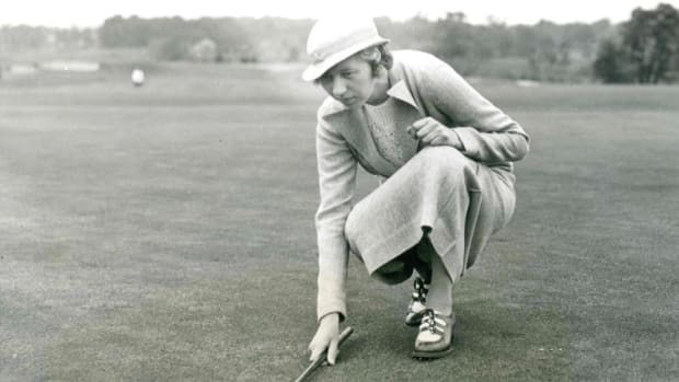 Joyce Wethered lines up a putt